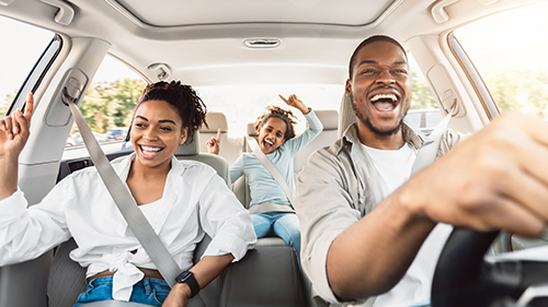 family in car