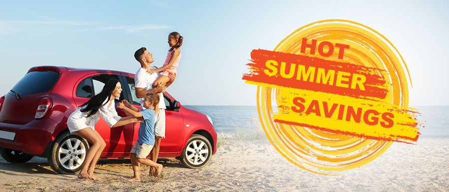 family with vehicle on beach