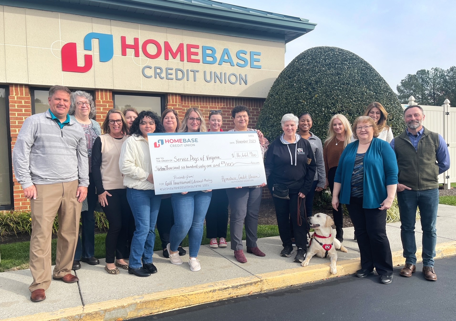 check presentation to Service Dogs