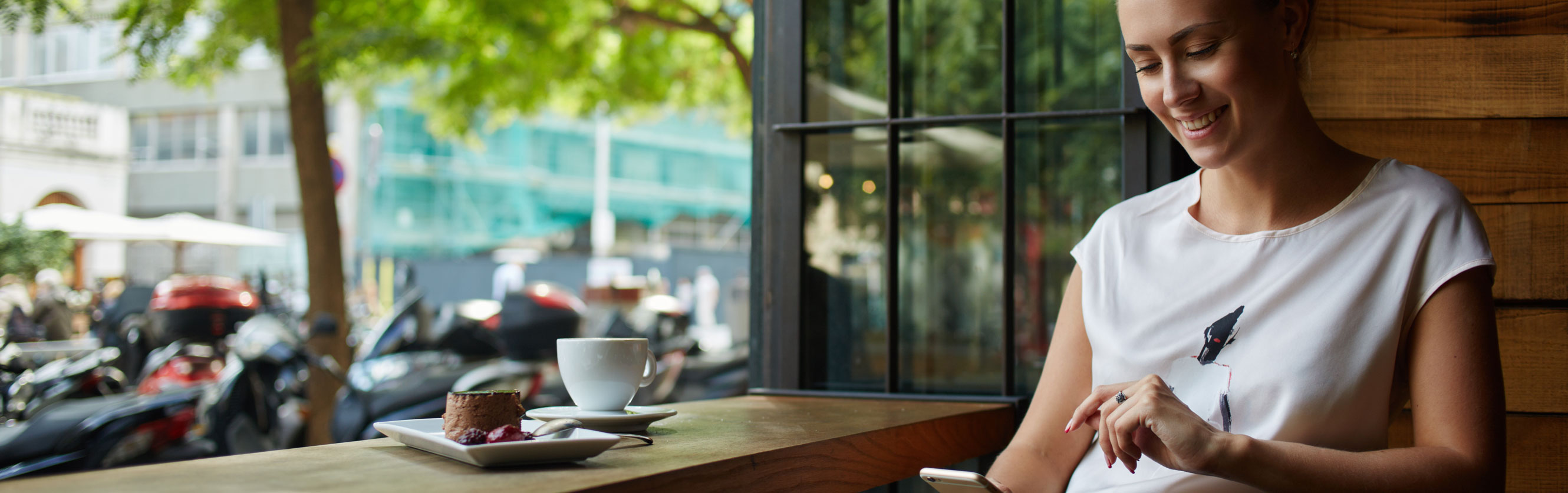 woman smiling with coffee