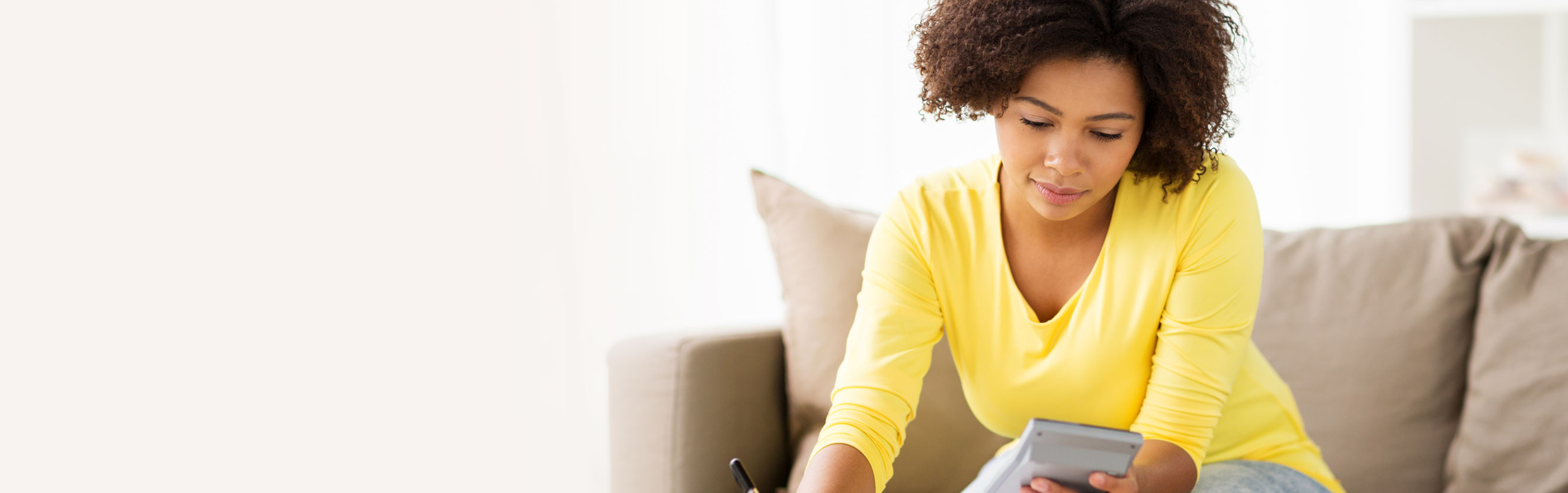 woman using calculator